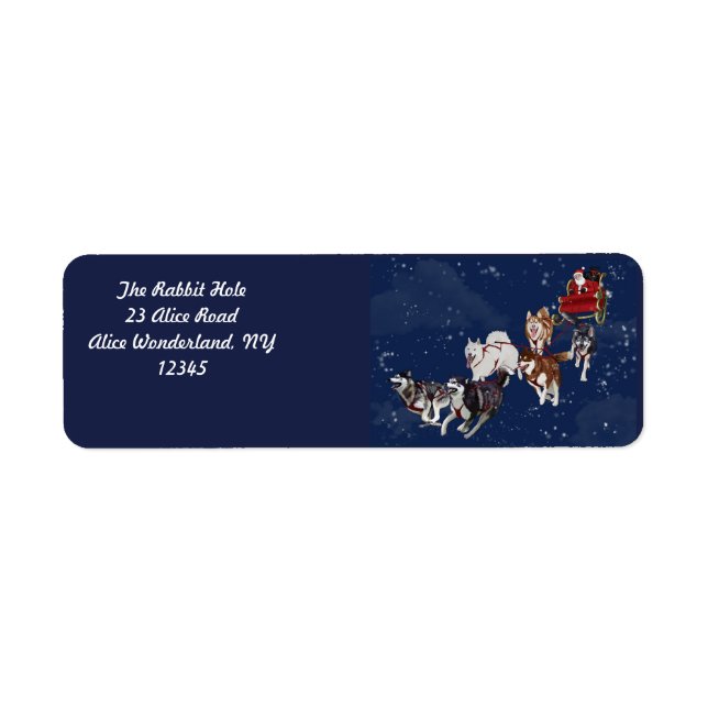 A fun pack of husky's pulling Santa's sleigh Label (Front)