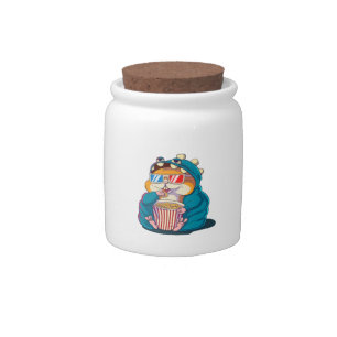 A funny hamster wearing glasses eats popcorn candy jar