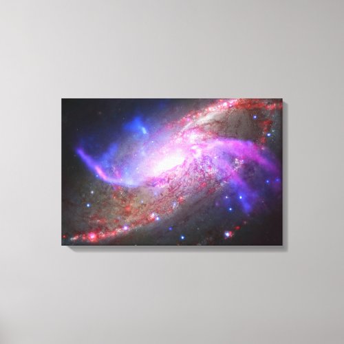A Galactic Light Show In Spiral Galaxy Ngc 4258 Canvas Print