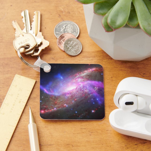 A Galactic Light Show In Spiral Galaxy Ngc 4258. Keychain (Desk)