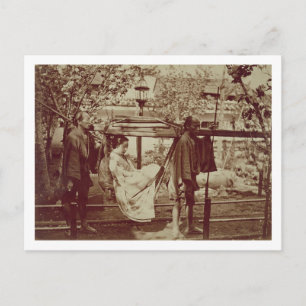 A Geisha being carried in a litter (sepia photo) Postcard