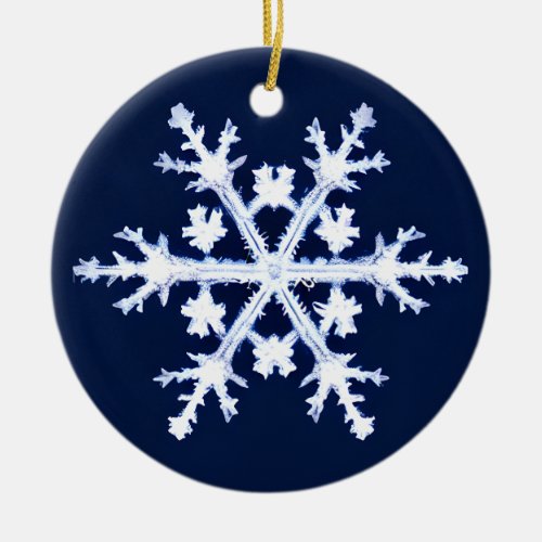 A Giant Ice Crystal Snowflake on Dark Indigo Blue Ceramic Ornament