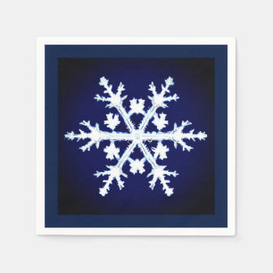 A Giant Ice Crystal Snowflake on Dark Indigo Blue Napkins