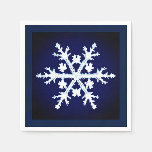 A Giant Ice Crystal Snowflake on Dark Indigo Blue Napkins