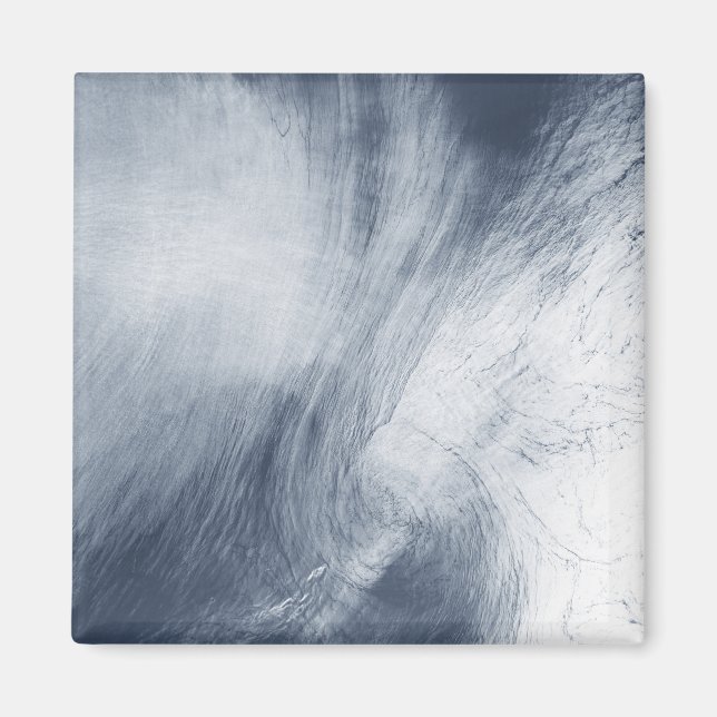 A giant whirlpool cloud swirls above the sea magnet (Front)