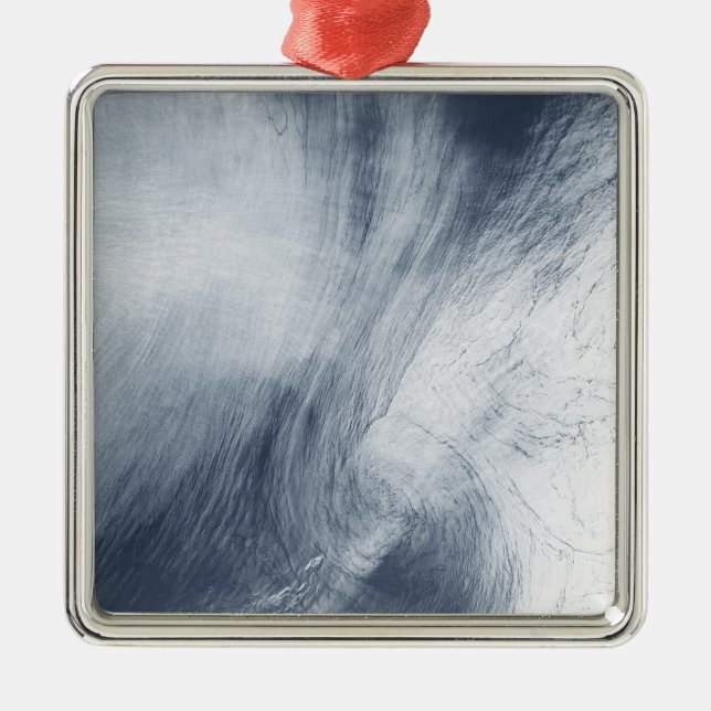 A giant whirlpool cloud swirls above the sea metal ornament (Front)