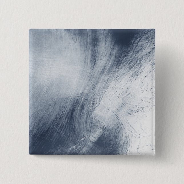 A giant whirlpool cloud swirls above the sea pinback button (Front)