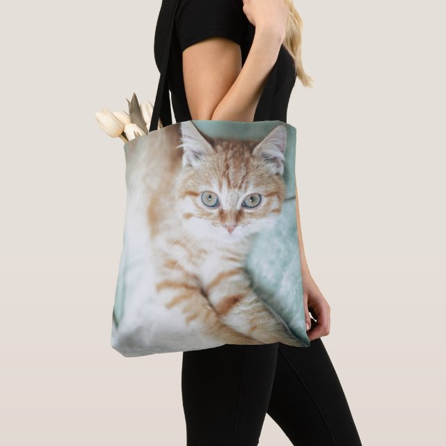 A Golden Color Kitten Lying Down Tote Bag (Close Up)