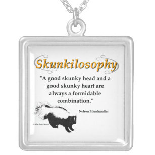 A good skunky head and a good skunky heart silver plated necklace