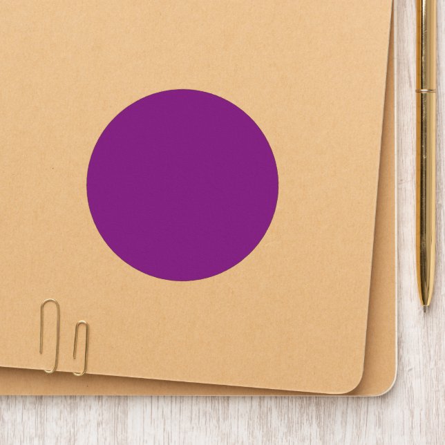 A gradient background blending shades of pink and  patch (On Folder)