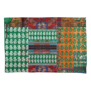 a green and black pattern with a tree in the middl pillow case