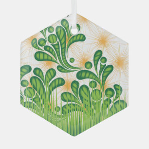A green and gold artistic pattern depicting a tree glass ornament