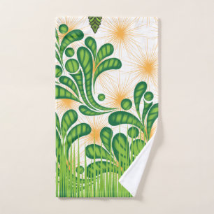 A green and gold artistic pattern depicting a tree hand towel
