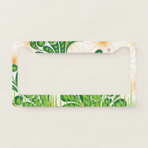 A green and gold artistic pattern depicting a tree license plate frame