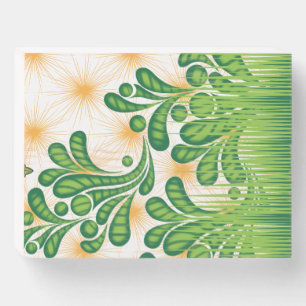 A green and gold artistic pattern depicting a tree wooden box sign