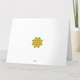 a green and red flower with black dots thank you card