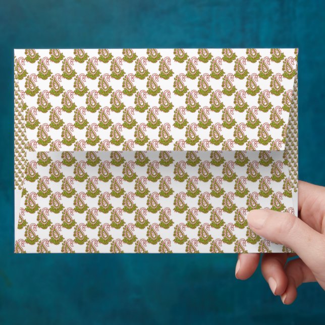 a green and white background with small leaves envelope (Hand)