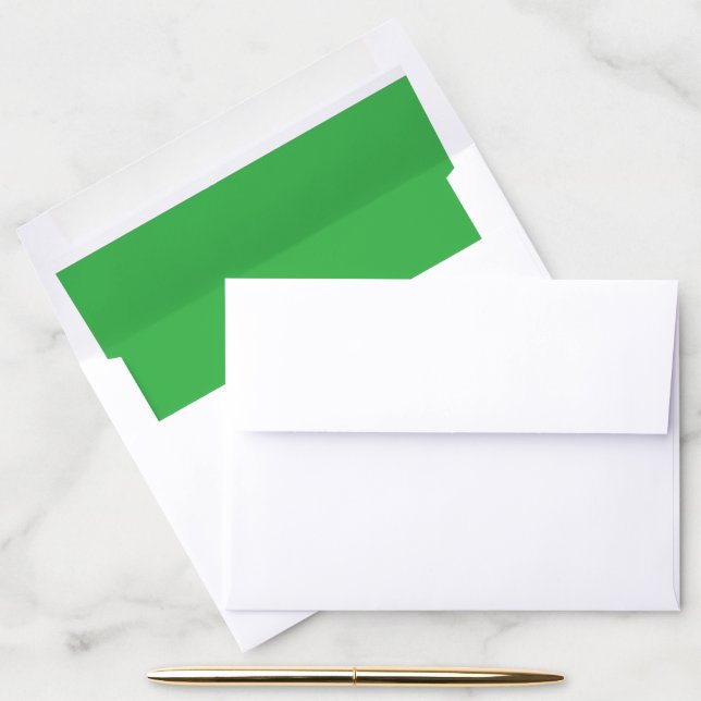 a green background with a white border envelope liner (Desk)