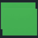 a green background with a white border letterhead<br><div class="desc">The image is a bright blue square with a uniform color and a smooth texture. It stands out against the background with a striking visual contrast.</div>