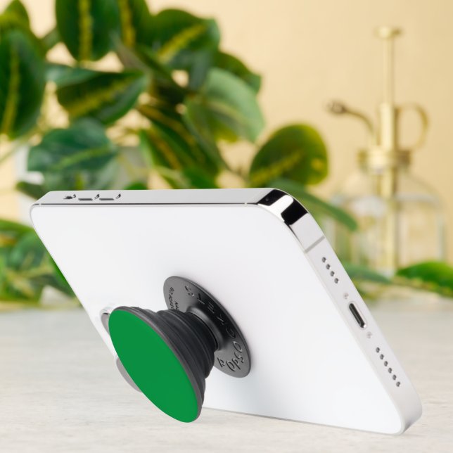 a green background with a white border PopSocket (Insitu)