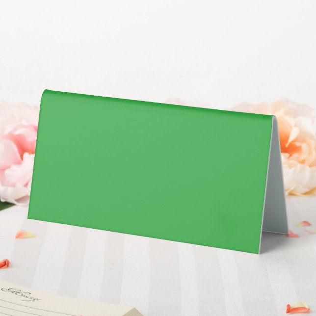 a green background with a white border table tent (In SItu (Wedding))