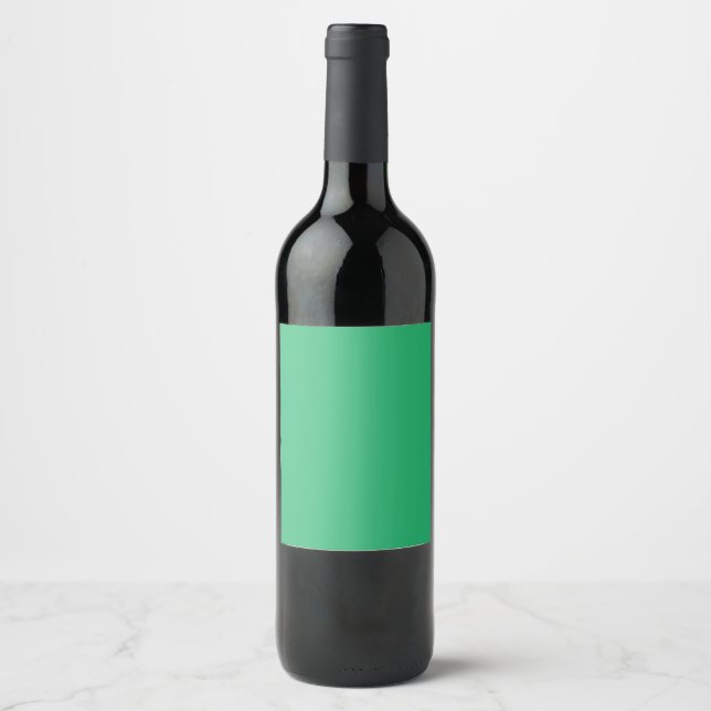a green background with a white border wine label (Front)
