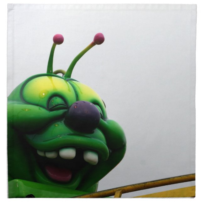 A green caterpillar goofy fair ride image napkin (Front)