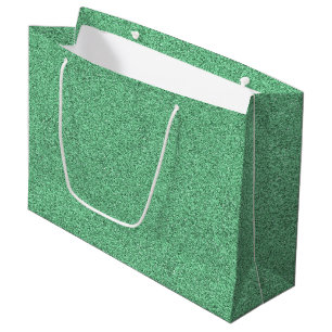 A green gift bag with a white rope handle