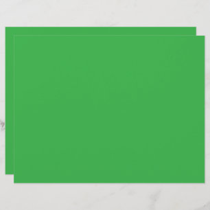 a green screen with a white background letterhead