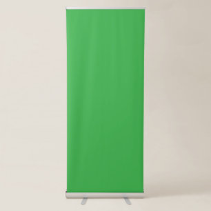 a green screen with a white background retractable banner
