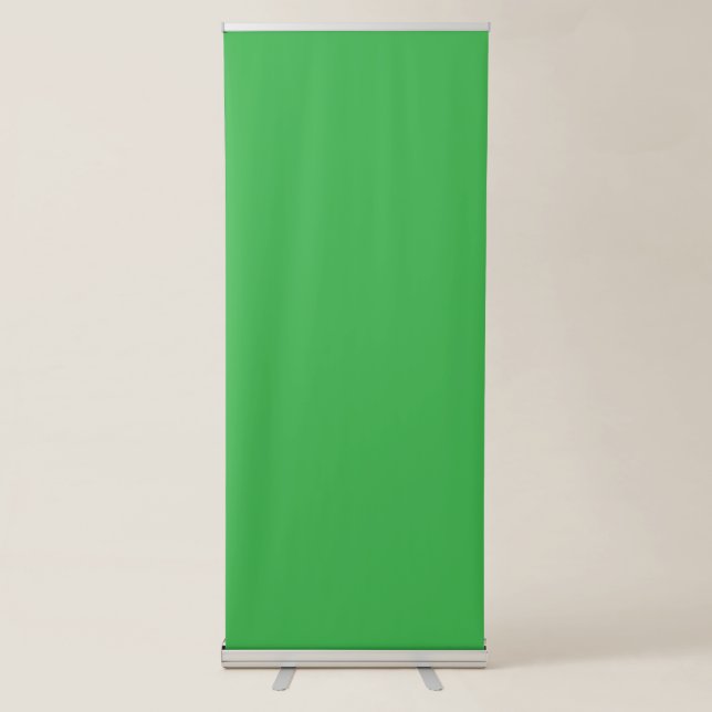 a green screen with a white background retractable banner (Front)