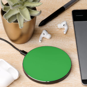 a green screen with a white background wireless charger 