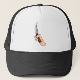A hand holding a knife trucker hat