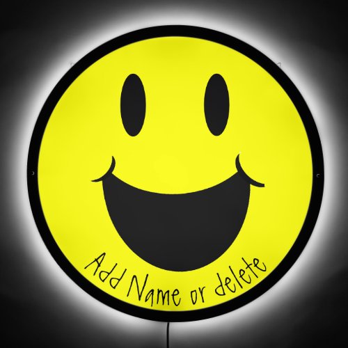 A happy yellow smile illuminated face icon  LED sign