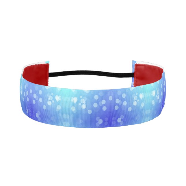 A headband with a blue gradient and white polka  (Front)