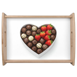 A heart-shaped box filled with gourmet chocolates serving tray