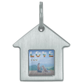 A heartwarming scene where a woman gazes lovingly pet ID tag