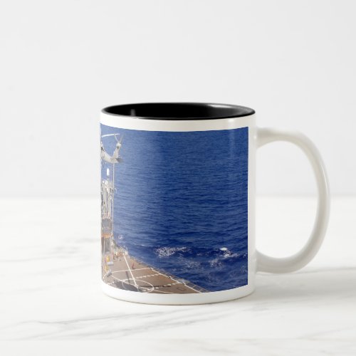 A helicopter clears the flight deck Two_Tone coffee mug
