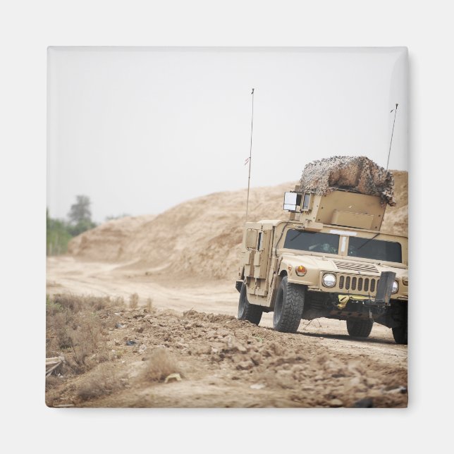 A Humvee conducts security Magnet (Front)