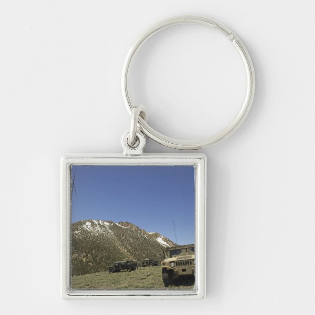 A Humvee is parked at the re-transmitting site Keychain (Front)