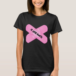 â€it still hurts†bandaid T-Shirt