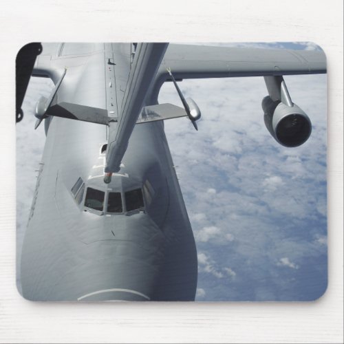 A KC_10 Extender prepares to refuel a C_5 Galax Mouse Pad