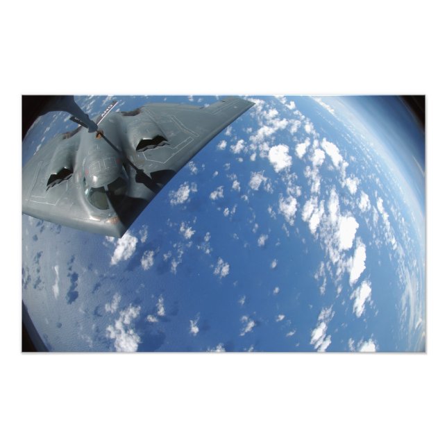 A KC-135 Stratotanker refuels a B-2 Spirit Photo Print (Front)
