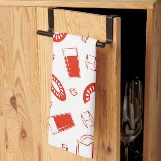 A kitchen towel with a bright, cheerful print.