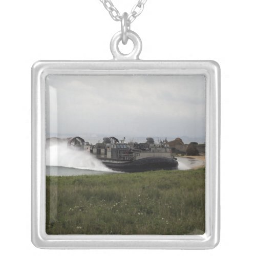 A landing craft air cushion comes ashore silver plated necklace