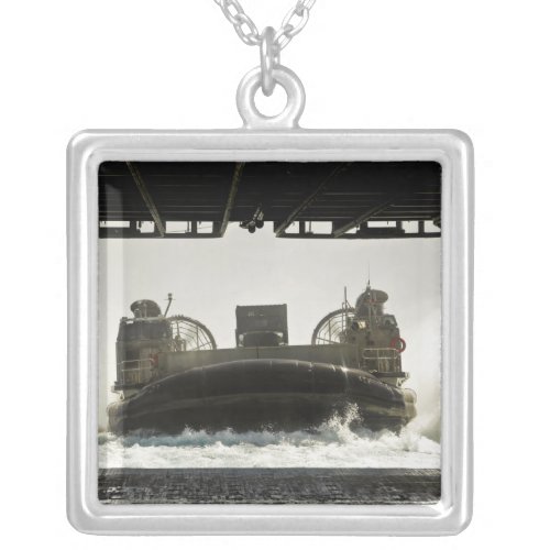 A landing craft air cushion prepares to enter silver plated necklace