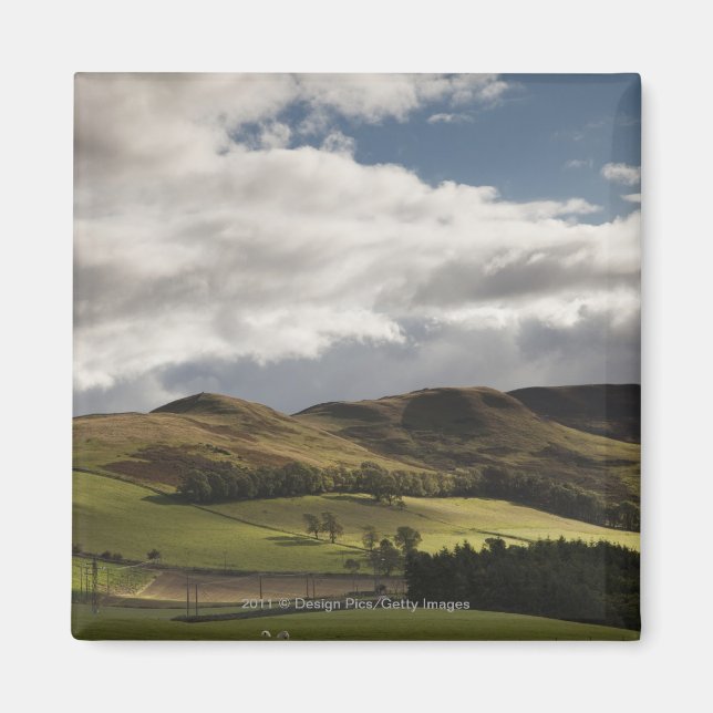 A Landscape With Rolling Hills And Clouds Overhead Magnet (Front)