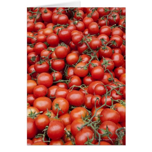 A large crop of tomato on a market stall in