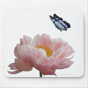 a large pink peony is visited by a ethereal mouse pad