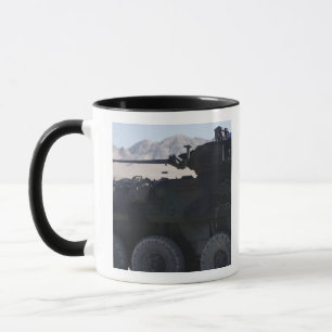 A light armored vehicle fires mug
